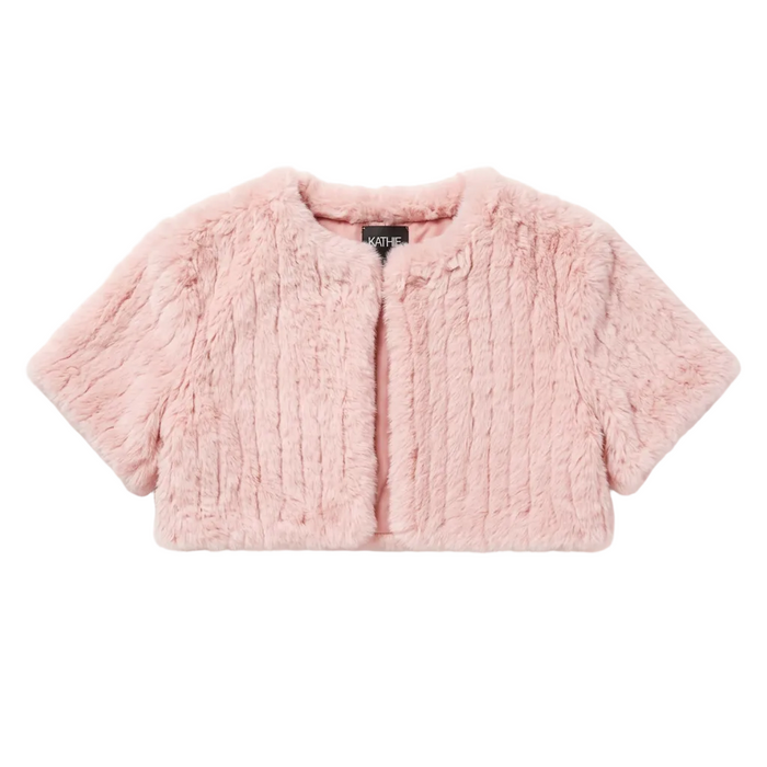 Pink bolero flat lay on a white background
